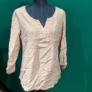 Tunic with sequins on the front